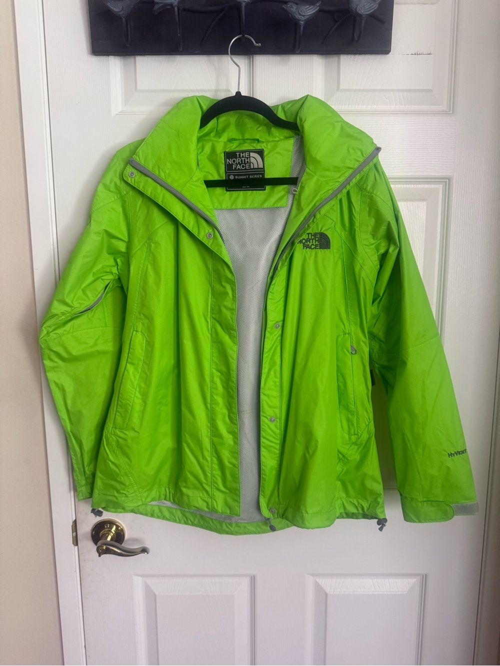 The North Face woman’s Lime Green Waterproof Jacket